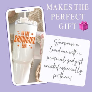 May include: White tumbler with the text "IN MY SHOWGIRL ERA" in orange, with star accents. The image is framed by a phone graphic, with text that reads "MAKES THE PERFECT GIFT" and "Surprise a loved one with a personalized gift created especially for them!"