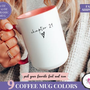 May include: White ceramic mug with a pink interior and handle. The mug has the text "chapter 21" with a heart symbol. The mug is available in 9 colors and comes in 11 oz and 15 oz sizes.