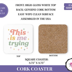 May include: Square cork coaster with a high-gloss white top and genuine cork bottom. The top features the text "This is me trying" in pastel colours. The coaster measures 9.5 x 9.5 cm.