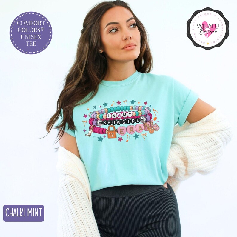 in my showgirl era bracelet shirt tswiftie inspired tee colorful fan girl gift eras tour t shirt 12 era pop culture music tee showgirl beaded stack shirt friendship bracelet graphic tee for concert colorful shirt for music lover eras fandom shirt taylor hoodie, kids taylor hoodie, youth sweatshirt, girls sweatshirt, toddler sweatshirt, youth crewneck, taylor apparel, taylor girls clothes, showgirl hoodie, kids showgirl shirt, youth showgirl tee, girls taylor shirt, showgirl costume