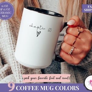 May include: White ceramic mug with black interior and handle. The mug features the text "chapter 60" with a heart symbol. The mug is available in 9 colors and comes in 11 oz and 15 oz sizes.
