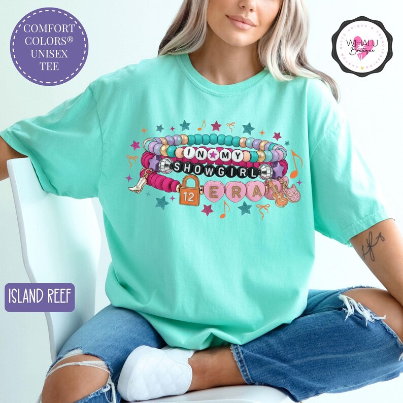 eras tour themed shirt in my era bracelet stack tshirt showgirl tee with beads album 12 lock fan shirt comfort colors pop fan tee colorful bracelet fan tee showgirl era inspired shirt music girl gift pop culture graphic t shirt for concerts and events taylor hoodie, kids taylor hoodie, youth sweatshirt, girls sweatshirt, toddler sweatshirt, youth crewneck, taylor apparel, taylor girls clothes, showgirl hoodie, kids showgirl shirt, youth showgirl tee, girls taylor shirt, showgirl costume