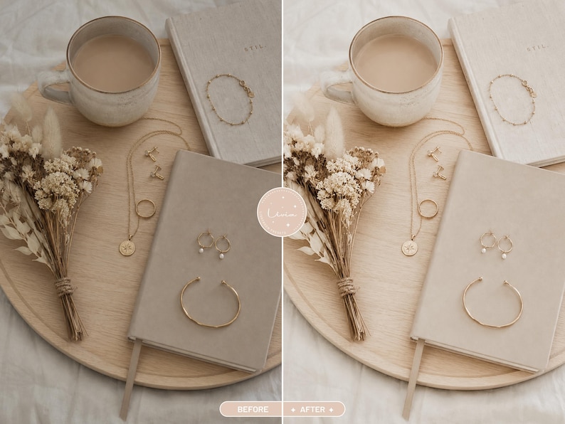May include: A round wooden tray holding a ceramic mug of coffee, a bouquet of dried flowers, two beige notebooks, a gold chain necklace with a circular pendant, a pair of small hoop earrings, and two gold bracelets arranged on a neutral surface.