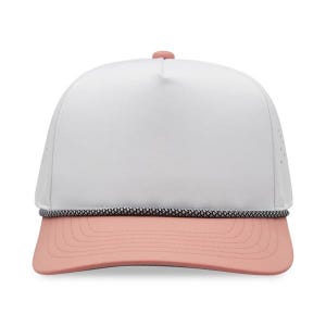 May include: A white trucker hat with a pink brim and a black and white rope detail. The hat has a mesh back and a pink button on top. This hat is a stylish accessory for outdoor activities.