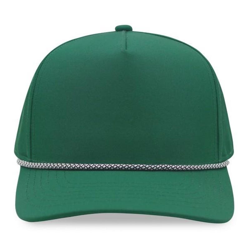 May include: A solid green baseball cap with a curved brim. The cap features a white and gray rope detail along the front. The cap has a rounded top and a classic, casual style.