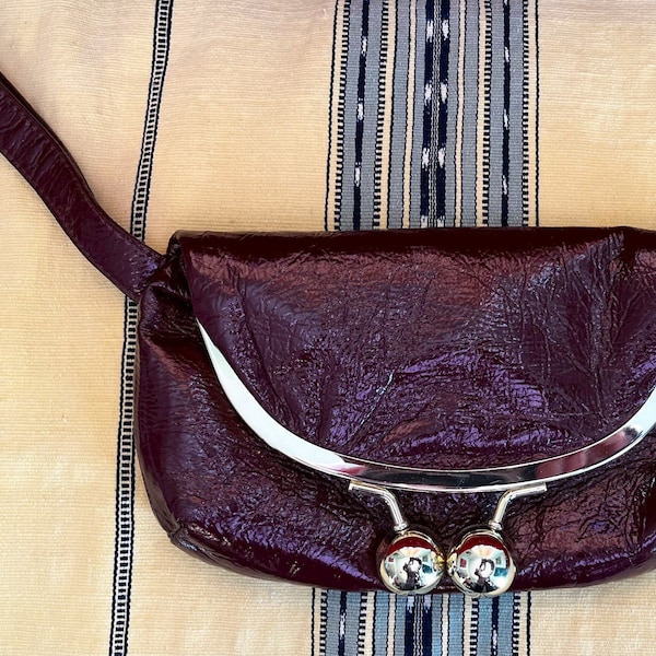 Vintage clutch with hand strap