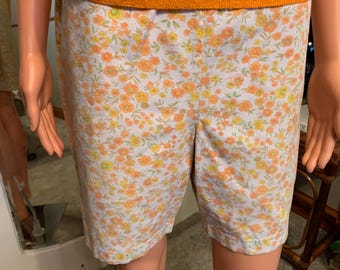 Shorts vintage de los años 60/70 con estampado floral y cremallera lateral, estilo retro mod, cintura alta, 66 cm, naranja, rosa y amarillo.