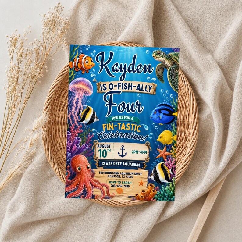 May include: A rectangular birthday invitation card featuring an underwater theme with a clownfish, sea turtle, jellyfish, octopus, and various tropical fish. The text reads: Kayden IS O-FISH-ALLY Four JOIN US FOR A FIN-TASTIC CELEBRATION! AUGUST 10TH 2PM-4PM GLASS REEF AQUARIUM 500 DOWNTOWN AQUARIUM DRIVE HOUSTON, TX 77002 RSVP TO SARAH 203-456-7890.