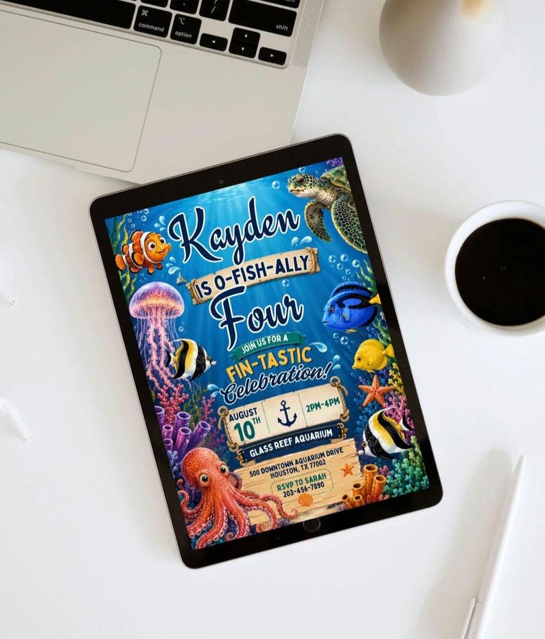 May include: A digital invitation on a tablet screen featuring an underwater theme with a sea turtle, clownfish, jellyfish, octopus, and blue tang. Text reads: Kayden is O-Fish-Ally Four, Join us for a Fin-Tastic Celebration, August 10th, 2pm-4pm, Glass Reef Aquarium, 500 Downtown Aquarium Drive, Houston, TX 77002, RSVP to Sarah 203-456-7890.