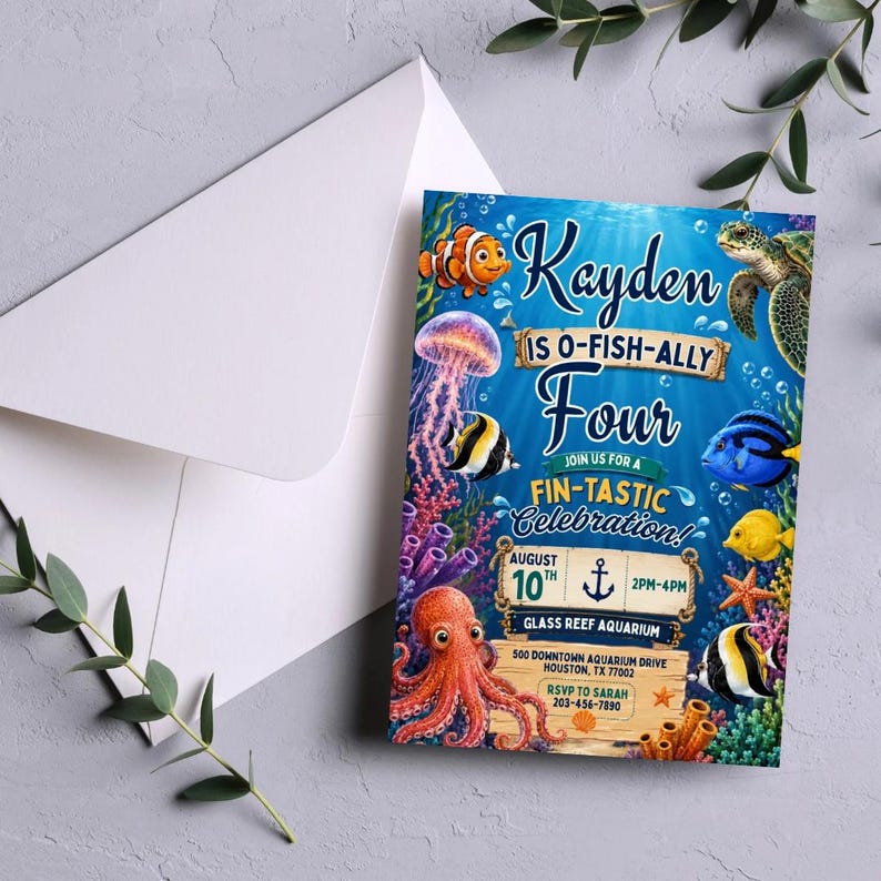 May include: A rectangular birthday invitation card featuring an underwater theme with a clownfish, jellyfish, sea turtle, octopus, and various tropical fish. The text reads: Kayden is O-Fish-Ally Four, Join us for a Fin-Tastic Celebration, August 10th, 2pm-4pm, Glass Reef Aquarium, 500 Downtown Aquarium Drive Houston, TX 77002, RSVP to Sarah 203-456-7890.