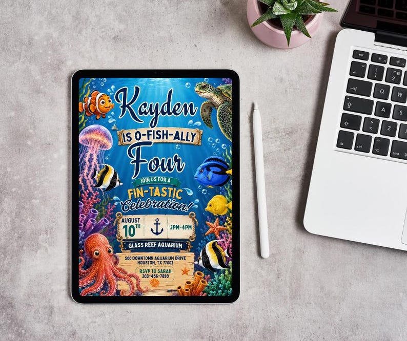 May include: A digital tablet displaying an underwater-themed birthday invitation for Kayden, who is turning four. The design features a clownfish, sea turtle, jellyfish, octopus, and various tropical fish against a blue background with text.