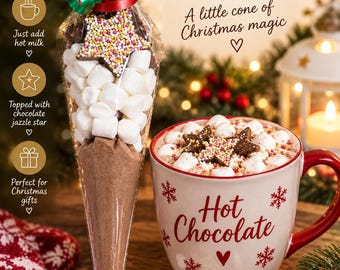 May include: A clear plastic cone filled with hot chocolate mix, white mini marshmallows, and a chocolate star with colorful sprinkles, tied with a green and red ribbon. Next to it is a white mug labeled Hot Chocolate filled with the drink.