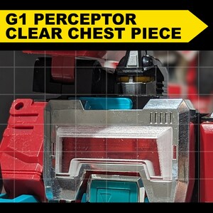 May include: Close-up of a red, black, and silver toy robot with a clear plastic chest piece. The robot has a black head with a yellow visor. The text "G1 PERCEPTOR CLEAR CHEST PIECE" is visible in the image.