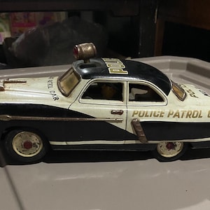 Vintage Antique Marusan Kosuge Blechspielzeug - 1952 Ford Patrol Polizeiauto, hergestellt in Japan, Sammlerstück