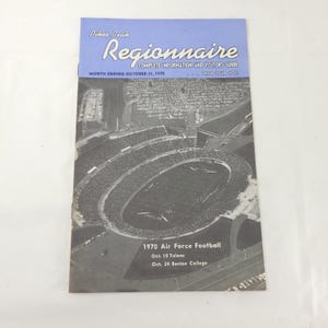 May include: Vintage "Regionnaire" guide from Pikes Peak, featuring a black and white aerial view of a football stadium. The guide includes the text "COMPLETE INFORMATION AND VISITORS GUIDE" and lists 1970 Air Force Football games.