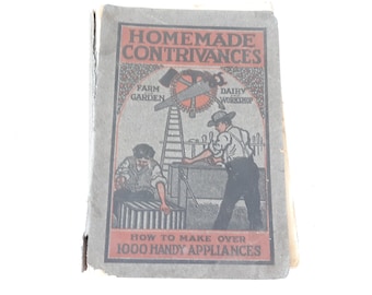 May include: A vintage book titled "Homemade Contrivances: Farm and Garden, Dairy and Workshop. How to Make Over 1000 Handy Appliances". The cover features an illustration of two men working on a wooden structure.