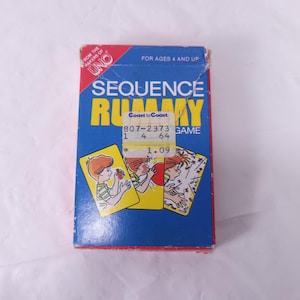 May include: A vintage "Sequence Rummy" card game box. The box is blue with yellow and red text, and illustrations of children playing cards. The text includes "UNO" and "Coast to Coast". The box is for ages 4 and up.