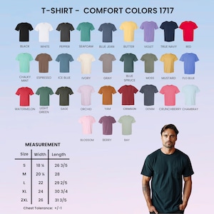 Puede incluir: Una variedad de camisetas Comfort Colors 1717 en varios colores, incluyendo negro, blanco y rojo. La imagen tambi&eacute;n muestra una tabla de tallas con medidas en cm, y un hombre con una camiseta verde oscuro.