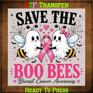 May include: A DTF transfer design featuring two ghost bees with yellow and black striped bodies, holding a pink breast cancer awareness ribbon. The text reads SAVE THE BOO BEES Breast Cancer Awareness. Includes spider webs, bats, and pink hearts.