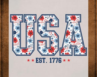May include: A patriotic design featuring the word "USA" in a collegiate font, filled with a floral pattern of red and blue flowers. The text "EST. 1776" is below, with red stars on each side. The design is ready to press.