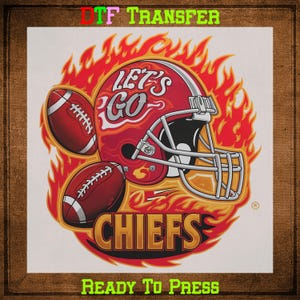 May include: A DTF transfer design featuring a red football helmet with the words "LET'S GO" and "CHIEFS" in white and gold, surrounded by flames and two footballs. The text "READY TO PRESS" is at the bottom.