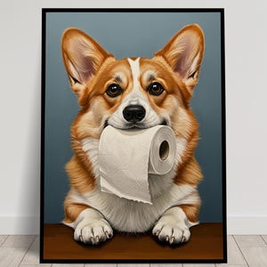 May include: A brown and white corgi dog with a playful expression is holding a white toilet paper roll in its mouth. The dog is sitting on a wooden surface with a blue background.
