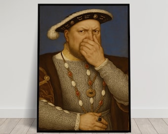May include: A framed portrait of a man in a black hat with a white trim, a gold and red necklace, and a ring. The man is covering his nose and mouth with his hand. The background is a solid blue.