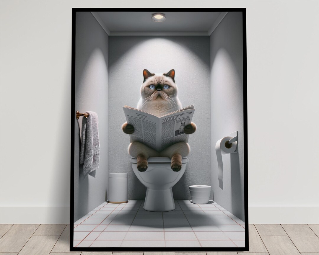 Photo of a Colorpoint Exotic Shorthair Cat Sitting on the Toilet ...
