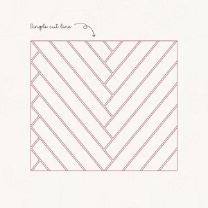 May include: A diagram showing a single cut line for a herringbone pattern. The pattern is made up of thin, parallel lines that intersect at an angle to create a chevron shape.