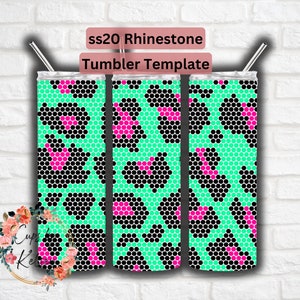 May include: Three stainless steel tumblers with a green and black leopard print design with pink accents. The tumblers are for sublimation and are ready to be customized.