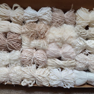 Mixed pack of 20 yarn bundles in creams, whites and neutrals with various weights, types and textures. Lenghs from 2m to 18m