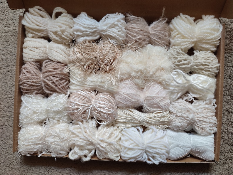 Mixed pack of 20 yarn bundles in creams, whites and neutrals with various weights, types and textures. Lenghs from 2m to 18m
