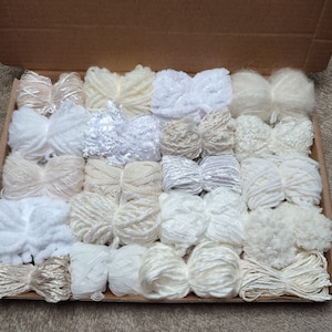 Mixed pack of 20 yarn bundles in creams, whites and neutrals. Various weights, types and textures. For weaving and much more