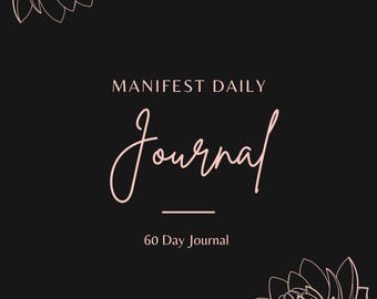 Può includere: Un'immagine in bianco e nero di un diario con il testo "MANIFEST DAILY Journal" e "60 Day Journal" su uno sfondo nero. L'immagine è decorata con due fiori di loto rosa.