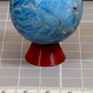 Vändbart rubinrött klotställ med 10 mm öppning för mineralkulor