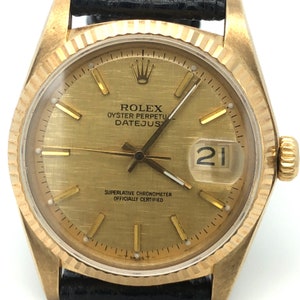 VINTAGE 1979 Rolex Date Just 36mm 18K Yellow Gold Champagne SIGMA Dial Watch 1601 sapphire Crystal with original Rolex band and buckle