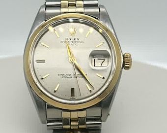 Armbanduhr aus Edelstahl und 14 Karat Gold mit Zwei Ton 34 mm, Modell 1500, Circa 1963