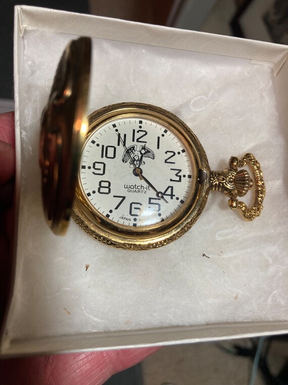 Gold pocket watch with eagle sale