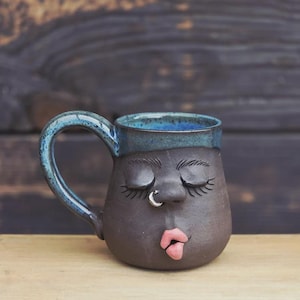 Handmade Ceramic Face Mug: Unique Stoneware Pottery with Silver Detail