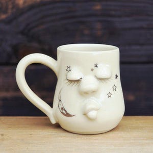 Handmade Ceramic Face Mug: Stoneware Pottery with Silver Accents