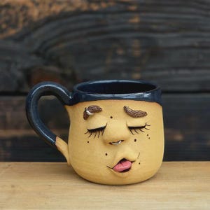 Handmade Ceramic Face Mug: Stoneware Pottery with Silver Accents