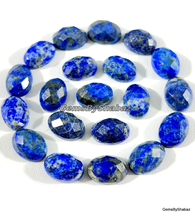 14 x 10 mm. Ovala rosenskurna lapis lazuli-cabochoner för att tillverka smycken och andra saker bild 1