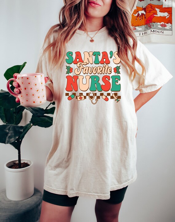 Comfort Colors® Christmas Gift For Santa's Favorite Nurse, Christmas Santa's Nurse Shirt, Nurse Christmas Gift, Nurse Life Vibes Christmas