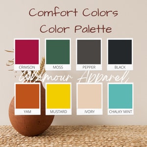 May include: A color palette titled "Comfort Colors" featuring eight color swatches: crimson, moss, pepper, black, yam, mustard, ivory, and chalky mint. The text "Glamour Apparel" is also present.