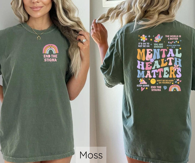 May include: Green t-shirt with a rainbow and the text "END.THE STIGMA" on the front and a colorful graphic with the text "MENTAL HEALTH MATTERS" on the back.