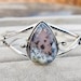 see more listings in the Silver Gemstone Bangle section