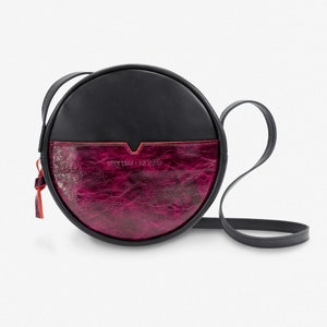 Round Black and Varnished Maroon leather HAPPY PILL crossbody, zipped leather handbag, adjustable strap