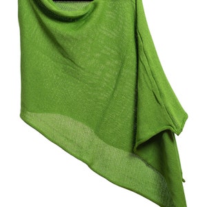 May include: A green knitted poncho with a cowl neck and a slightly asymmetrical hem.