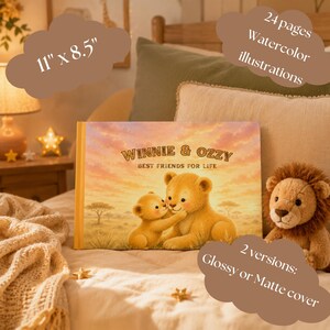 May include: A hardcover book measuring 11 inches by 8.5 inches, featuring a watercolor illustration of two lion cubs on the cover with the text Winnie & Ozzy Best Friends For Life. The book contains 24 pages and offers glossy or matte cover options.