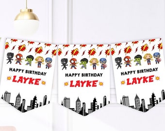 May include: Three white pennant banners with a cityscape silhouette at the bottom. Each banner features a row of cartoon superheroes, including Spiderman, Hulk, and Captain America. The text "Happy Birthday Layke" is printed in red on each banner.